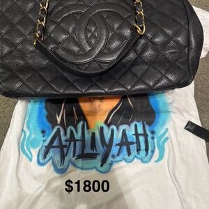 CHANEL Black Quilted Leather Bag with Gold Chain